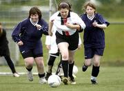30 April 2005; Christine Simpson, Leinster, in action against Mary Strain, right, and Marion Gallagher, Ulster. Europe Eurasia Football Week 2005, Women's 7-a-side Final, Ulster v Leinster, AUL Complex, Clonshaugh, Dublin. Picture credit; Pat Murphy / SPORTSFILE
