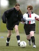 30 April 2005; Pamela Kavanagh, Ulster, in action against Helen Connors, Leinster. Europe Eurasia Football Week 2005, Women's 7-a-side Final, Ulster v Leinster, AUL Complex, Clonshaugh, Dublin. Picture credit; Pat Murphy / SPORTSFILE