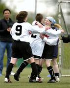 30 April 2005; Ann Marie Byrne, right, Helen Connors, centre and Christine Carr, 9, Leinster, celebrate victory over Ulster. Europe Eurasia Football Week 2005, Women's 7-a-side Final, Ulster v Leinster, AUL Complex, Clonshaugh, Dublin. Picture credit; Pat Murphy / SPORTSFILE