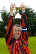 30 April 2005; John Leavy, Cheeverstown, lifts the cup after victory over Belfast. Europe Eurasia Football Week 2005, Men's National Cup Final, Belfast v Cheeverstown, AUL Complex, Clonshaugh, Dublin. Picture credit; Pat Murphy / SPORTSFILE