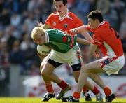 24 April 2005; Conor Mortimer, Mayo, in action against Aaron Kernan and Andy Mallon, right, Armagh. Allianz National Football League Semi-Final, Armagh v Mayo, Croke Park, Dublin. Picture credit; Ray McManus / SPORTSFILE