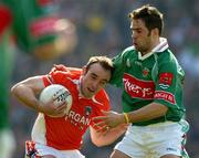 24 April 2005; Malachy Mackin, Armagh, in action against James Gill, Mayo. Allianz National Football League Semi-Final, Armagh v Mayo, Croke Park, Dublin. Picture credit; Ray McManus / SPORTSFILE