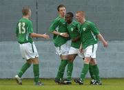 28 April 2005; Emeka Onwublko, second from right, Republic of Ireland, celebrates with team-mates Mark O'Toole (13), Rhys Murphy and Terry Dixon, right, after scoring his sides first goal. U16 Friendly International, Republic of Ireland U16 v Sweden U16, Whitehall, Dublin. Picture credit; Brian Lawless / SPORTSFILE