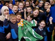 15 December 2004; Damien Thomson, centre holding jersey, aged 10, from Dublin, with his classmates after he was presented with a Bradford Bulls shirt which he designed for the team. Holy Rosary National School, Firhouse, Dublin. Picture credit; David Maher / SPORTSFILE