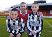 16 April 2004; Owen Heary, Shelbourne captain, pictured with mascots John Moran, left, and Alan Brophy, Kingswood, Tallaght. eircom league, Premier Division, Shelbourne v Longford Town, Tolka Park, Dublin. Picture credit; Damien Eagers / SPORTSFILE *EDI*