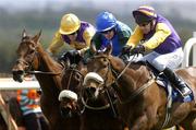 29 April 2005; Brave Inca, left, with Tony McCoy up, on their way to winning the Emo Oil Champion Hurdle Macs Joy, with Barry Geraghty, who finished third, Harchibald, right, with Paul Carberry, who finished second. Punchestown Racecourse, Co. Kildare. Picture credit; Matt Browne / SPORTSFILE