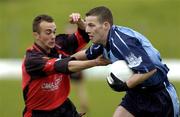 30 April 2005; Ian Ward, Dublin, is tackled by Conor Laverty, Down. Cadbury's All-Ireland U21 Football Semi-Final, Dublin v Down, Pairc Tailteann, Navan, Co. Meath. Picture credit; Matt Browne / SPORTSFILE