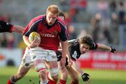 30 April 2005; Paul O'Connell, Munster, is tackled by Marcus Di Rollo, Edinburgh Rugby. Celtic Cup 2004-2005, Quarter-Final, Munster v Edinburgh Rugby, Thomond Park, Limerick. Picture credit; Kieran Clancy / SPORTSFILE