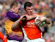 1 May 2005; Ronan Clarke, Armagh, in action against Philip Wallace, Wexford. Allianz National Football League, Division 1 Final, Armagh v Wexford, Croke Park, Dublin. Picture credit; David Maher / SPORTSFILE