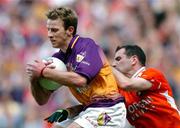 1 May 2005; Niall Murphy, Wexford, in action against Steven McDonnell, Armagh. Allianz National Football League, Division 1 Final, Armagh v Wexford, Croke Park, Dublin. Picture credit; David Maher / SPORTSFILE