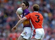 1 May 2005; John Hudson, Wexford, in action against Francie Bellew, Armagh. Allianz National Football League, Division 1 Final, Armagh v Wexford, Croke Park, Dublin. Picture credit; Brendan Moran / SPORTSFILE