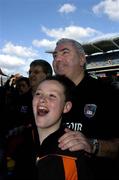 1 May 2005; Joe Kernan, Armagh manager, celebrates at the end of the game with his son Ross after victory over Wexford. Allianz National Football League, Division 1 Final, Armagh v Wexford, Croke Park, Dublin. Picture credit; David Maher / SPORTSFILE