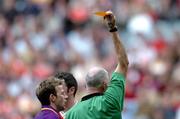 1 May 2005; Referee Gerry Kinneavy shows the yellow card to Niall Murphy, Wexford. Allianz National Football League, Division 1 Final, Armagh v Wexford, Croke Park, Dublin. Picture credit; David Maher / SPORTSFILE
