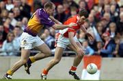 1 May 2005; Ronan Clarke, Armagh, in action against Philip Wallace, Wexford. Allianz National Football League, Division 1 Final, Armagh v Wexford, Croke Park, Dublin. Picture credit; Brendan Moran / SPORTSFILE
