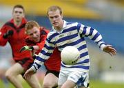 2 May 2005; Donie Brennan, Knockbeg College, in action against Kieran O'Connor, St Mary's College. All-Ireland Colleges Senior 'A' Football Final, St. Mary's College v Knockbeg College, Semple Stadium, Thurles, Co. Tipperary. Picture credit; Brendan Moran / SPORTSFILE