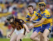 2 May 2005; Peter Barry, Kilkenny, in action against Tony Griffin, right, and Diarmuid McMahon, Clare. Allianz National Hurling League, Division 1 Final, Clare v Kilkenny, Semple Stadium, Thurles, Co. Tipperary. Picture credit; Ray McManus / SPORTSFILE