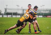 14 January 2014; Eoin MacLoughlin, Skerries C.C, is tackled by Cian Twohey, left, and Graham Brennan, St. Patrick's Classical School, Navan. Fr. Godfrey Cup, 1st Round, St. Patrick's Classical School, Navan v Skerries C.C, Ashbourne RFC, Ashbourne, Co. Meath. Picture credit: Ramsey Cardy / SPORTSFILE