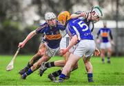 15 January 2014; Shane Kingston, St Francis College Rochestown, is tackled by Enda Heffernan, left, and Brendan Larkin, Thurles CBS. Dr. Harty Cup Quarter-Final, Thurles CBS v St Francis College Rochestown, Cahir, Co. Tipperary. Picture credit: Ramsey Cardy / SPORTSFILE