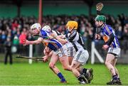 15 January 2014; Enda Heffernan, Thurles CBS, in action against Cathal Sheehan, left, Mark Dolan, St Francis College Rochestown, supported by Chris McCullagh, Thurles CBS. Dr. Harty Cup Quarter-Final, Thurles CBS v St Francis College Rochestown, Cahir, Co. Tipperary. Picture credit: Ramsey Cardy / SPORTSFILE