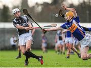 15 January 2014; David Griffin, St Francis College Rochestown, has a shot blocked by Ronan Heffernan, Thurles CBS. Dr. Harty Cup Quarter-Final, Thurles CBS v St Francis College Rochestown, Cahir, Co. Tipperary. Picture credit: Ramsey Cardy / SPORTSFILE