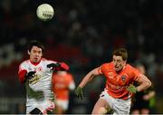 15 January 2014; Mattie Donnelly, Tyrone, in action against Charlie Vernon, Armagh. Power NI Dr. McKenna Cup, Section A, Round 3, Tyrone v Armagh, Healy Park, Omagh, Co. Tyrone. Picture credit: Oliver McVeigh / SPORTSFILE