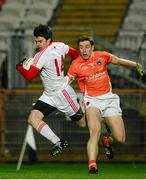 15 January 2014; Mattie Donnelly, Tyrone, in action against Charlie Vernon, Armagh. Power NI Dr. McKenna Cup, Section A, Round 3, Tyrone v Armagh, Healy Park, Omagh, Co. Tyrone. Picture credit: Oliver McVeigh / SPORTSFILE