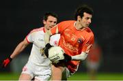 15 January 2014; Jamie Clarke, Armagh, in action against Aidan McCrory, Tyrone. Power NI Dr. McKenna Cup, Section A, Round 3, Tyrone v Armagh, Healy Park, Omagh, Co. Tyrone. Picture credit: Oliver McVeigh / SPORTSFILE