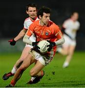 15 January 2014; Jamie Clarke, Armagh, in action against Aidan McCrory, Tyrone. Power NI Dr. McKenna Cup, Section A, Round 3, Tyrone v Armagh, Healy Park, Omagh, Co. Tyrone. Picture credit: Oliver McVeigh / SPORTSFILE