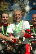 27 June 2004; David O'Loughlin, totalcycling.com, celebrates his win and the Total Cycling team victory flanked by team-mates Aaron Deane and Tommy Evans in the Senior Men's Road Race. National Road Race Cycling Championships, Sligo. Picture credit; Gerry McManus / SPORTSFILE