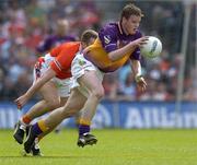 1 May 2005; David Murphy, Wexford, in action against John McEntee, Armagh. Allianz National Football League, Division 1 Final, Armagh v Wexford, Croke Park, Dublin. Picture credit; Brendan Moran / SPORTSFILE