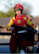 11 January 2014; Jockey Roger Loughran after the race. Punchestown Racecourse, Punchestown, Co. Kildare. Picture credit: Ramsey Cardy / SPORTSFILE
