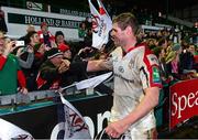 18 January 2014; Johann Muller, Ulster, celebrates with supporters after the game. Heineken Cup 2013/14, Pool 5, Round 6, Leicester Tigers v Ulster, Welford Road, Leicester, England. Picture credit: Oliver McVeigh / SPORTSFILE