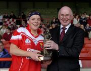 30 April 2005; Niall O'Gorman, General Manager, Suzuki Ireland. presents the ' Player of the Match' award to Cork's Valerie Mulcahy. Suzuki Ladies National Football League, Division 1 Final, Cork v Galway, Gaelic Grounds, Limerick. Picture credit; Ray McManus / SPORTSFILE