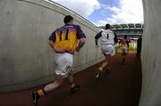 1 May 2005; Wexford players run onto the pitch for the start of the game. Allianz National Football League, Division 1 Final, Armagh v Wexford, Croke Park, Dublin. Picture credit; David Maher / SPORTSFILE