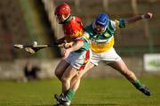 7 May 2005; Damien Roberts, Carlow, in action against Brian Carroll, Offaly. Allianz National Hurling League, Division 2 Final, Offaly v Carlow, O' Moore Park, Portlaoise, Co. Laois. Picture credit; Ray McManus / SPORTSFILE