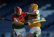 7 May 2005; Pat Cody, Carlow, in action against Niall Caffrey, Offaly. Allianz National Hurling League, Division 2 Final, Offaly v Carlow, O' Moore Park, Portlaoise, Co. Laois. Picture credit; Ray McManus / SPORTSFILE
