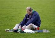7 May 2005; A dejected Carlow goalkeeper Pat Fenlon sits on the field during the trophy presentation. Allianz National Hurling League, Division 2 Final, Offaly v Carlow, O' Moore Park, Portlaoise, Co. Laois. Picture credit; Ray McManus / SPORTSFILE