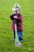 7 May 2005; One and a half year old Caoimhe Coady, whose dad Pat played at right-half-forward for Carlow, from Bahana, St Mullins, Co Carlow, examines his hurley after the game. Allianz National Hurling League, Division 2 Final, Offaly v Carlow, O' Moore Park, Portlaoise, Co. Laois. Picture credit; Ray McManus / SPORTSFILE