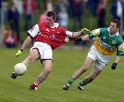 8 May 2005; Alan Page, Louth, in action against Karol Slattery, Offaly. Bank of Ireland All-Ireland Senior Football Championship, Offaly v Louth, Pairc Tailteann, Navan, Co. Meath. Picture credit; Damien Eagers / SPORTSFILE
