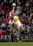 8 May 2005; Ciaran McManus, Offaly, contests a high ball with John Kermath, Louth. Bank of Ireland All-Ireland Senior Football Championship, Offaly v Louth, Pairc Tailteann, Navan, Co. Meath. Picture credit; Damien Eagers / SPORTSFILE