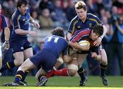 8 May 2005; Donnacha O'Callaghan, Munster, is tackled by Brian O'Driscoll, right and Denis Hickie (11), Leinster. Celtic Cup 2004-2005 Semi-Final, Leinster v Munster, Lansdowne Road, Dublin. Picture credit; Brendan Moran / SPORTSFILE