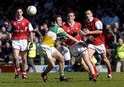 8 May 2005; Ronan Carroll, Louth, in action against Damien Hunt, Offaly. Bank of Ireland All-Ireland Senior Football Championship, Offaly v Louth, Pairc Tailteann, Navan, Co. Meath. Picture credit; Damien Eagers / SPORTSFILE