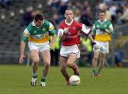 8 May 2005; Ciaran McManus, Offaly, in action against Darren Clarke, Louth. Bank of Ireland All-Ireland Senior Football Championship, Offaly v Louth, Pairc Tailteann, Navan, Co. Meath. Picture credit; Damien Eagers / SPORTSFILE