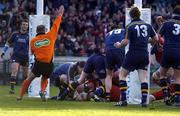 8 May 2005; Referee Nigel Whitehouse signals a last minute winning try scored by Anthony Foley, Munster (bottom frame with red and black skull cap). Celtic Cup 2004-2005 Semi-Final, Leinster v Munster, Lansdowne Road, Dublin. Picture credit; Brendan Moran / SPORTSFILE