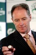 9 May 2005; Brian Kerr, Republic of Ireland manager, draws a ball at the 2005 FAI Carlsberg Cup Second Round draw. Gravity Bar, Guinness Hopstore, Dublin. Picture credit; David Maher / SPORTSFILE