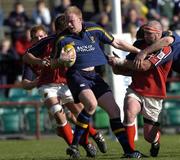8 May 2005; Des Dillon, Leinster, is tackled by John Hayes, Munster. Celtic Cup 2004-2005 Semi-Final, Leinster v Munster, Lansdowne Road, Dublin. Picture credit; Brian Lawless / SPORTSFILE