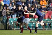8 May 2005; Peter Stringer, Munster, is tackled by Shane Horgan, left, and Malcolm O'Kelly, Leinster. Celtic Cup 2004-2005 Semi-Final, Leinster v Munster, Lansdowne Road, Dublin. Picture credit; Brian Lawless / SPORTSFILE