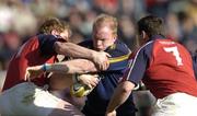 8 May 2005; Des Dillon, Leinster, is tackled by Anthony Horgan, left, and David Wallace, Munster. Celtic Cup 2004-2005 Semi-Final, Leinster v Munster, Lansdowne Road, Dublin. Picture credit; Brian Lawless / SPORTSFILE