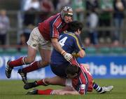 8 May 2005; Shane Horgan, Leinster, is tackled by David Wallace and Alan Quinlan, left, Munster. Celtic Cup 2004-2005 Semi-Final, Leinster v Munster, Lansdowne Road, Dublin. Picture credit; Brian Lawless / SPORTSFILE