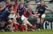 8 May 2005; Peter Stringer, Munster, gets the ball away from Leinster's oncoming Shane Byrne, left, and Denis Hickie. Celtic Cup 2004-2005 Semi-Final, Leinster v Munster, Lansdowne Road, Dublin. Picture credit; Brian Lawless / SPORTSFILE